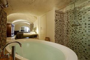 Kylpyhuone majoituspaikassa Fra I Sassi Residence