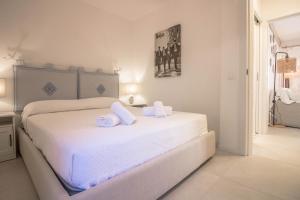 Imagen de la galería de Portisco Bouganville Seaside Charm Flat W/ Veranda, en Marina di Portisco