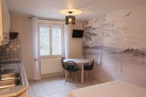 TV a/nebo společenská místnost v ubytování "Quen'Toy Apparts" Studio 2p