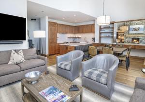 a living room with a couch and a table at Highlands Westview 300 condo in Beaver Creek