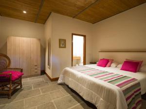 Postel nebo postele na pokoji v ubytování Luxury Banana Haven Villa with pool by CanaryScape + 56 fotografií