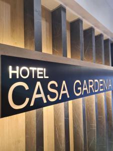 a sign for a hotel casa garilla on a building at Hotel Casa Gardenia in Barcelona