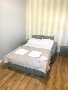 Llit o llits en una habitació de Apartment Spartak