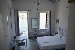 Кровать или кровати в номере Marea Apartments