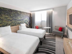 Cama ou camas em um quarto em Novotel Blois Centre Val De Loire