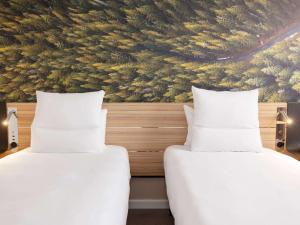 Cama ou camas em um quarto em Novotel Blois Centre Val De Loire