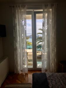 Postel nebo postele na pokoji v ubytování Guesthouse Punta Mira - Beachfront