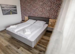 Voodi või voodid majutusasutuse Hotel-Restaurant Zum Schwalbennest toas