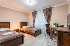 Postel nebo postele na pokoji v ubytování Penzion U Císařské cesty