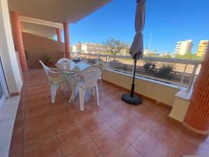 A balcony or terrace at Delfines II Solo Familias Serviplaya