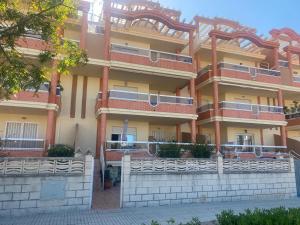 A balcony or terrace at Delfines II Solo Familias Serviplaya