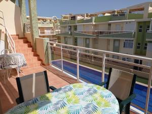 A balcony or terrace at Delfines III Solo Familias Serviplaya