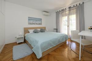Postel nebo postele na pokoji v ubytování Krebel in Poreč - Istrien