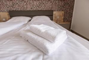 Voodi või voodid majutusasutuse Hotel-Restaurant Zum Schwalbennest toas
