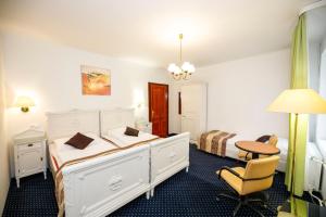 Letto o letti in una camera di Hotel Grand