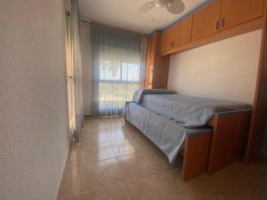 Postel nebo postele na pokoji v ubytování Bitacora II solo Familias Serviplaya + 100 fotografií