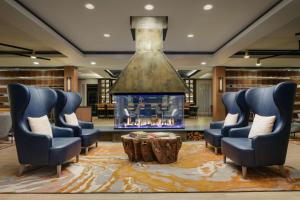 Posezení v ubytování The Hoffmann Hotel Basalt Aspen Tapestry Collection Hilton