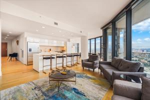 a living room with a couch and a table at 3 Bed 3 Bath Penthouse at Prime Location in Los Angeles