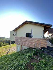 a house on the side of a hill at Ferienwohnung Weingut Koller in Kitzeck im Sausal +10 photos
