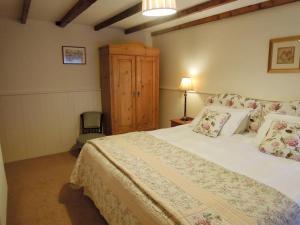 Voodi või voodid majutusasutuse The Cider Barn toas