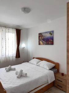 Postel nebo postele na pokoji v ubytování Angel Apartment Srebrno jezero