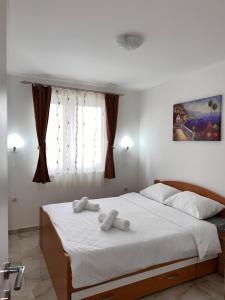 Postel nebo postele na pokoji v ubytování Angel Apartment Srebrno jezero