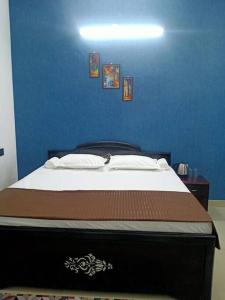 Katil atau katil-katil dalam bilik di SitaRamalayam Homestay 1 (GF)