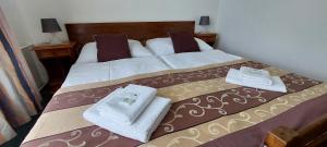 Letto o letti in una camera di Hotel Grand