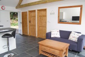 Posezení v ubytování Morvoren Cottage