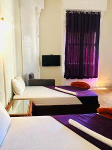 Postel nebo postele na pokoji v ubytování OH! Cairo Pharaoh Hostel