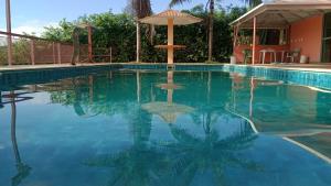 Swimmingpoolen hos eller tæt på Suites Hidromassagem - Pousada Vale da Serra + 22 billeder