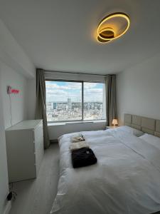 Postel nebo postele na pokoji v ubytování Paris Bleu