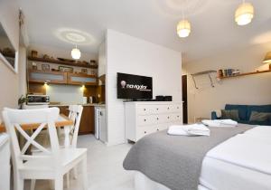 Posteľ alebo postele v izbe v ubytovaní Apartamenty NAVIGATOR-PORT