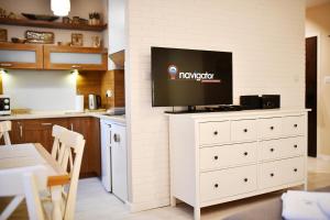 Kuchyňa alebo kuchynka v ubytovaní Apartamenty NAVIGATOR-PORT