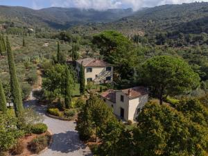 an aerial view of a house in the hills at VILLA SAN PIETRO in Cortona