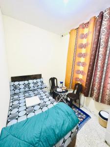 Postel nebo postele na pokoji v ubytování MKB APARTMENTS