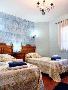 Krevet ili kreveti u jedinici u okviru objekta 8 bedrooms house with furnished terrace at Cenicientos