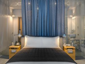 Letto o letti in una camera di Hotel Gault
