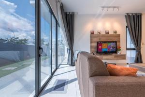 Imagen de la galería de 14pax+Cozy@Semi-Villa Seremban, en Siliau 57 fotos más