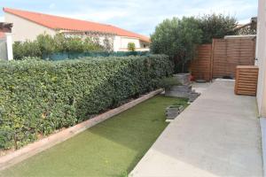 Κήπος έξω από το Maison MAS DE LA PLAGE villa 4 LEUCATE NATURISME PL040-004 +4 φωτογραφίες