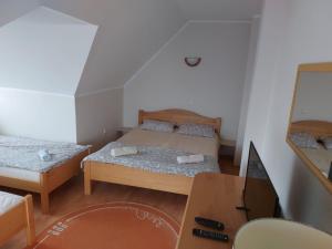 Apartmani MiM客房内的一张或多张床位