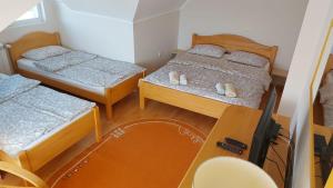Apartmani MiM客房内的一张或多张床位