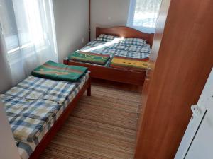 Apartmani MiM客房内的一张或多张床位