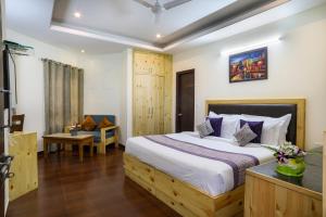 Letto o letti in una camera di Hotel SunGrace