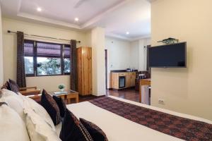 TV o dispositivi per l'intrattenimento presso Hotel SunGrace