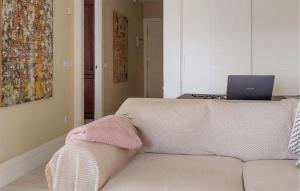 A bed or beds in a room at Gorgeous Apartment In A Pobra Do Caramial With Wifi