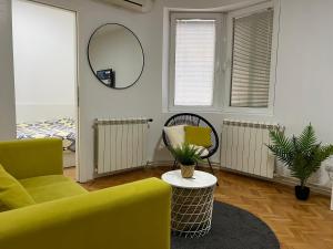 Posezení v ubytování Cozy Apartment in Belgrade Downtown