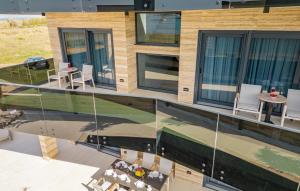 an aerial view of a house with a swimming pool at 5 Bedroom Beautiful Home In Privlaka in Privlaka