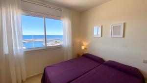 Кровать или кровати в номере Residencial Marina de Port
