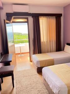 Postel nebo postele na pokoji v ubytování Hotel Chaouen